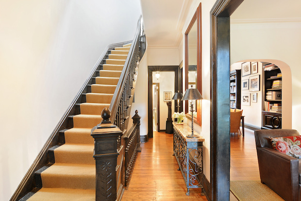  A three-bedroom Lincoln Park rowhouse described as an "architectural gem" is on the market for $1,495,000.&nbsp; Built in 1895, 2123 N. Sedgwick St. has modern updates while maintaining its charm with high ceilings, custom cabinetry, crown moldings and its original staircase,&nbsp;  according to @proper  ties' Teri Rabai  .  