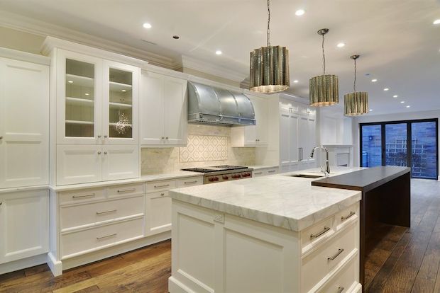  A five-bedroom home with two full kitchens is on the market in Lincoln Park for $4,250,000.&nbsp; The master suite at 2032 N. Clifton Ave. covers 1,000 of the home's 7,200 square feet of interior space, according to&nbsp;  Bair  d & Warner's Nick Kluding  .  