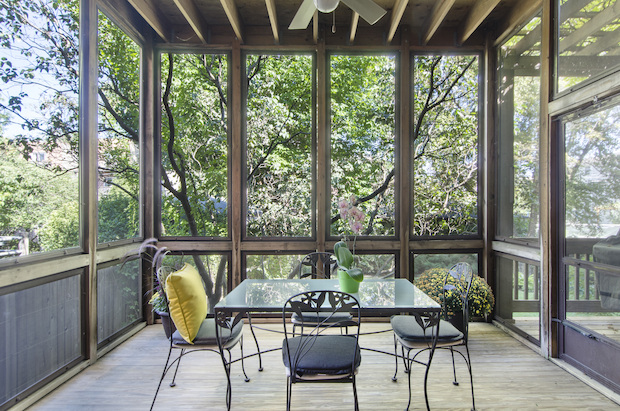   Thanks to big windows, 2663 N. Bosworth Ave. has views of greenery and its garden from every room.  