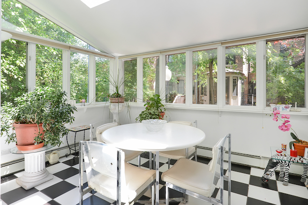   Built in 1905, 841 W. Chalmers Place has spacious bedrooms, three fireplaces and large windows.  