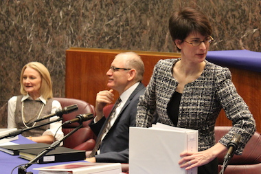  Budget Director Alexandra Holt (r.) prepares for a 2015 budget hearing.
 