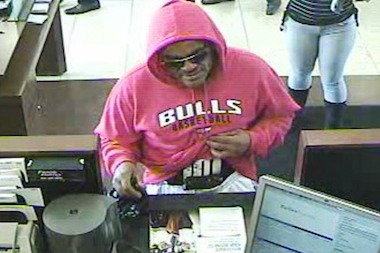  A man in red-hooded Bulls sweatshirt robbed a Chase Bank branch at 7180 W. Grand on Wednesday. 
