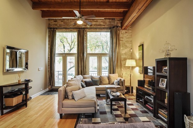  The home at 1815 N. Orchard St. No. 6 has exposed brick and high timber ceilings throughout. 