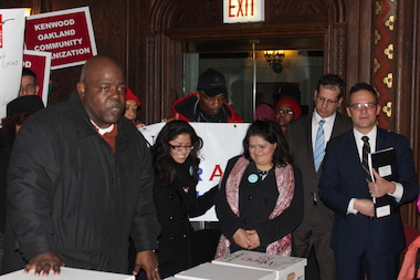  Aldermen John Arena and Joe Moreno (r.) backed Jitu Brown as they prepared to submit petitions to put a referendum for an elected school board on the ballot in 38 wards. 