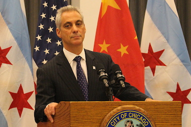  Mayor Rahm Emanuel says he's put more police officers on the street by taking them off desk jobs. 