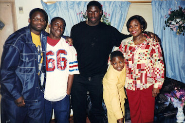  Charles (from l.), Michael, Victor, James and Deborah Adeyanju are shown during James' 10th birthday at their Gage Park home. Victor Adeyanju, now 31, serves as a database analyst for Best Western Hotels in Arizona after playing in the NFL for four-plus years. 