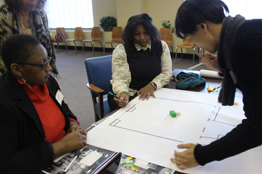  Five students doing an independent study with an architect/adjunct professor are helping to design a business innovation center that the Greater Englewood Community Development Corporation is pursuing. Students met with the business community Thursday, Feb. 12, 2015. 