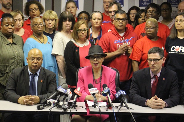  Chicago Teachers Union President Karen Lewis (center) and Vice President Jesse Shakey (right) hammered out a tentative deal with CPS officials Monday. 