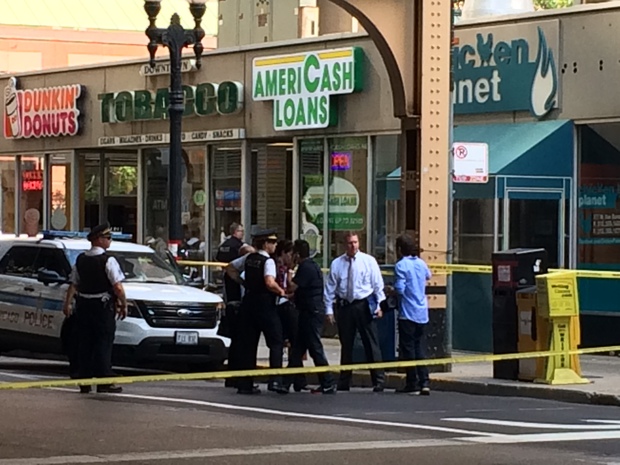  Police found two people shot dead in an Americash Loan store in the Loop Friday afternoon. 