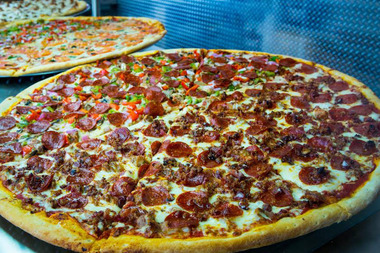  The pizza shop at 3435 W. 26th St. will give its first 100 customers free slices on Saturday. 