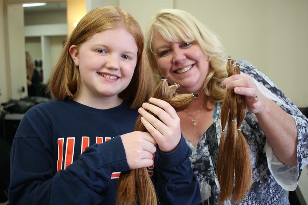  Catie Schultz, 10, of Morgan Park cut off 13 inches of her hair Sunday with the intent of donating her strawberry locks to Wigs for Kids. The charity creates custom wigs for children battling cancer or other health issues that result in hair loss. 