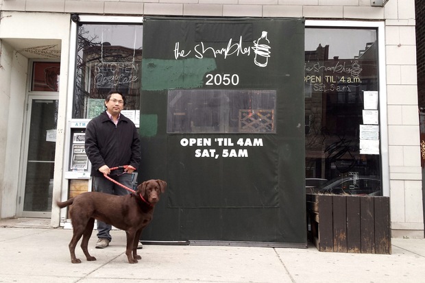  Joe Lin, owner of The Shamble, 2050 W. Division St. with his dog, Daisy.  