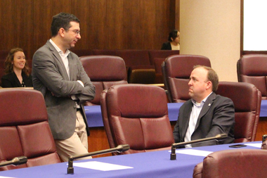  Aldermen Scott Waguespack and Brendan Reilly discuss the home-sharing ordinance before a Wednesday committee meeting. 