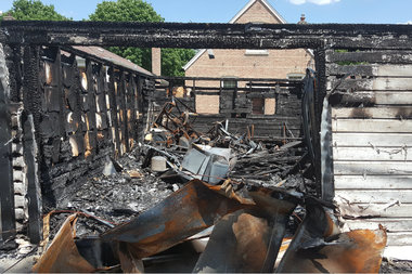  Henry McCann Jr.'s garage exploded as he went to open the door after he saw someone in his backyard. 
