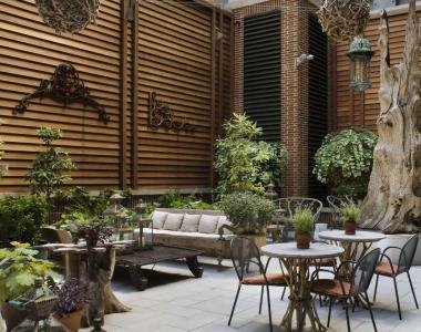 A court yard, with natural light, open space and plants, contributed to the Crosby Street Hotel's LEED Gold certification. 