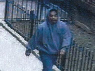 Police are looking for this man in connection with a Christmas morning mugging. 