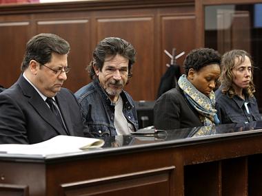 Thomas Smith (second from left) and Andrea Ruggieri (far right), appear in Manhattan Criminal Court on March 18, 2012 to face charges of stealing a rabbit from a SoHo boutique.