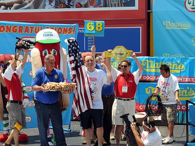 Joey Chestnut, after downing 68 hot dogs to take the crown for the sixth time in a row at the Nathan's Famous Fourth of July International Hot Dog Eating Contest on Coney Island Wednesday, July 4, 2012.