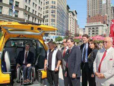 Victor Calise of the NYC Mayor’s Office for People with Disabilities tests out one of the city’s wheelchair-accessible taxis. The taxi is part of Accessible Dispatch, NYC’s new wheelchair-accessible taxi service launched on Friday, Sept. 14, 2012.