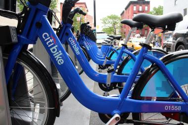   The crook sat in a wheelchair before standing up and assaulting the Citi Bike rider, police said.  