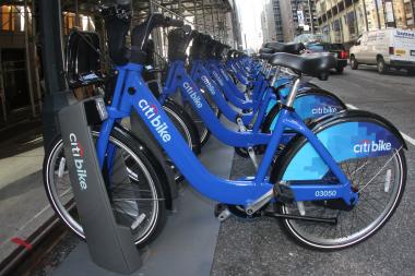  A woman on a Citi Bike was clipped by a car at Broadway and Grand Street on Wednesday. 
