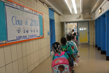  Kindergarteners walk to class at KIPP AMP Elementary School in Crown Heights. The brand new school is one of three charter elementaries opening in Brooklyn's District 17 for fall 2013, making Crown Heights one of the city's most charter-dense neighborhoods.  
