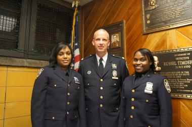  Officers of the month pose with 71st Precinct Commander Deputy Inspector John Lewis. After weathering one of the most dramatic crime increases in New York City this year, the precinct is on track to break even with its crime rate in 2012.  
