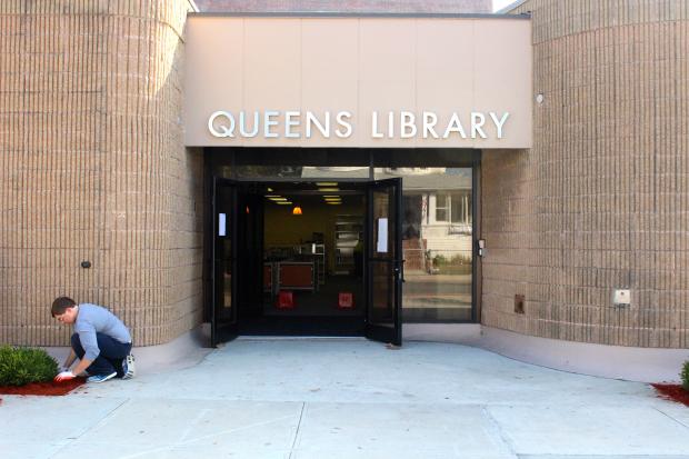  The library, which was severely damaged by Hurricane Sandy, will reopen nearly a year after the storm. 
