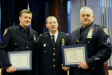  Officer Lucas Organista, Deputy Inspector Michael J. LiPetri and Sgt. Kieran Fox at a 79th Precinct Community Council Meeting, on March 27, 2014. Organista and Kieran were honored for arresting the 14-year-old accused of shooting and killing a man on the B14 bus in Bed-Stuy. 
