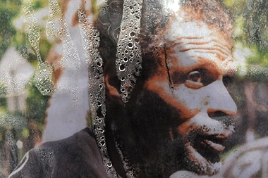  A portrait of Gilbert Kelley hung at a streetside memorial on Friday April 25, 2014. 