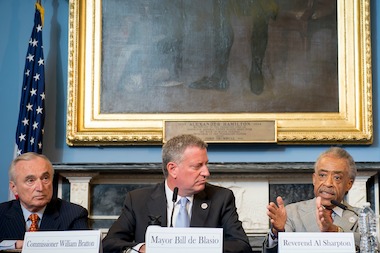  Mayor  Bill de Blasio  and the Rev.  Al Sharpton  put to rest rumors that there was a rift between them Monday with a hug and complimentary comments about one another during a Martin Luther King Jr. Day event in Harlem. Here, de Blasio sits with Sharpton and Police Commissioner William Bratton at a City Hall press conference about Eric Garner. 