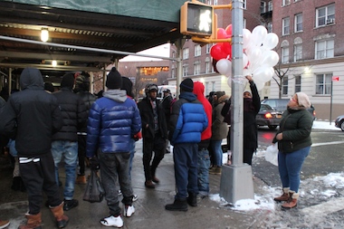  Neighbors, friends and family of 19-year-old Jaquay Bennett gather on Friday afternoon at the site of the shooting on Thursday that killed him. 