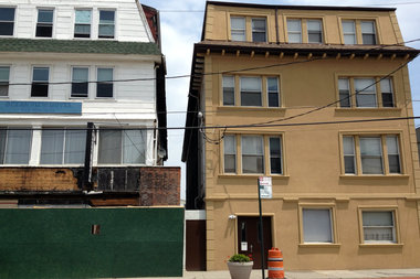  The former Rockaway Park Hotel, the beige building, sold on June 3, records show. 