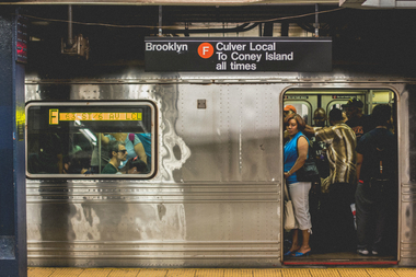  F train riders stood up to a man verbally abusing two women wearing hijabs Monday morning. 