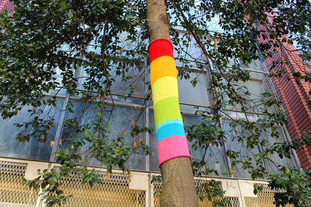  A local mom decided to brighten up the front of the school with "yarn bombs." 