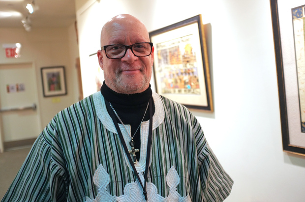  Andrew Jackson stands in the second-floor art gallery at the Langston Hughes Community Library in Corona on Feb. 1, 2016. He's set to retire from the center after more than three decades, where he oversaw massive expansion of the library. 