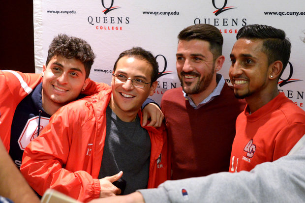  David Villa poses with Queens College soccer players and students.  