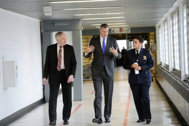  Mayor Bill de Blasio walks through a facility at Rikers Island. The mayor's office has been looking at a proposal to shut down Rikers Island and move inmates to two new jails and renovated borough detention facilities. 