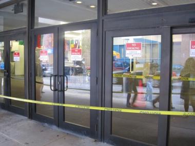 Yellow Tape bars the front entrance to North Hall on the John Jay College of Criminal Justice Campus.  Administrators closed the building to exterminate an infestation of bed bugs.