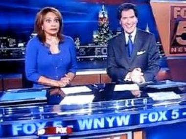 Co-anchor Dari Alexander shows her surprise after anchor Ernie Anastos swears on live television on Wednesday.