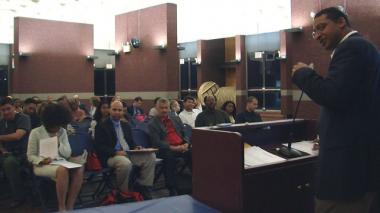 Manny Velazquez speaking at a meeting of Community Board 12 in September, when he was chairman.