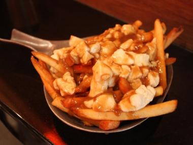 Poutine, pronounced 