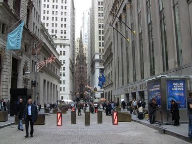 The city improved the security barriers on Wall St. last year, but they still block off public space.