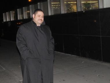 Wilfredo Rosario leaving court on Thursday. The police officer has been accused of sexually abusing several women.