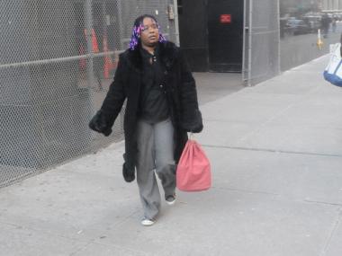 Akwasiba Radellant leaves court after hearing testimony that pot was found in her daycare.
