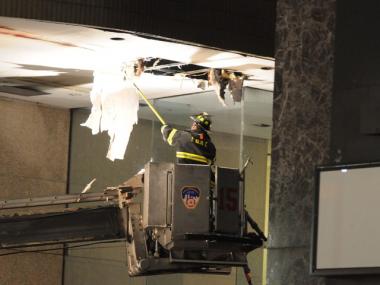 Firefighters battle the blaze.