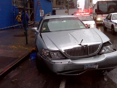 The driver of this Cadillac allegedly jumped the curb and hit three people while turning onto Second Avenue from 86th Street.