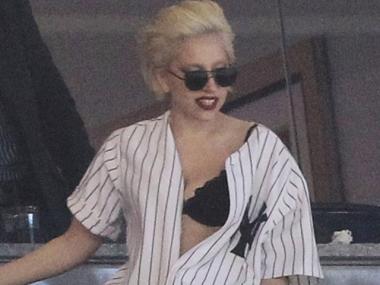 Lady Gaga goes gaga again, this time at the Yankee stadium. The drunken singer groped herself and slugged whiskey in front of team players in their private clubhouse after Friday's loss to the Mets.
