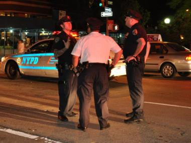 NYPD were seen on the scene of the hit and run later Friday night.