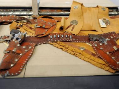 Roy Rogers' gun holster and antique guns.